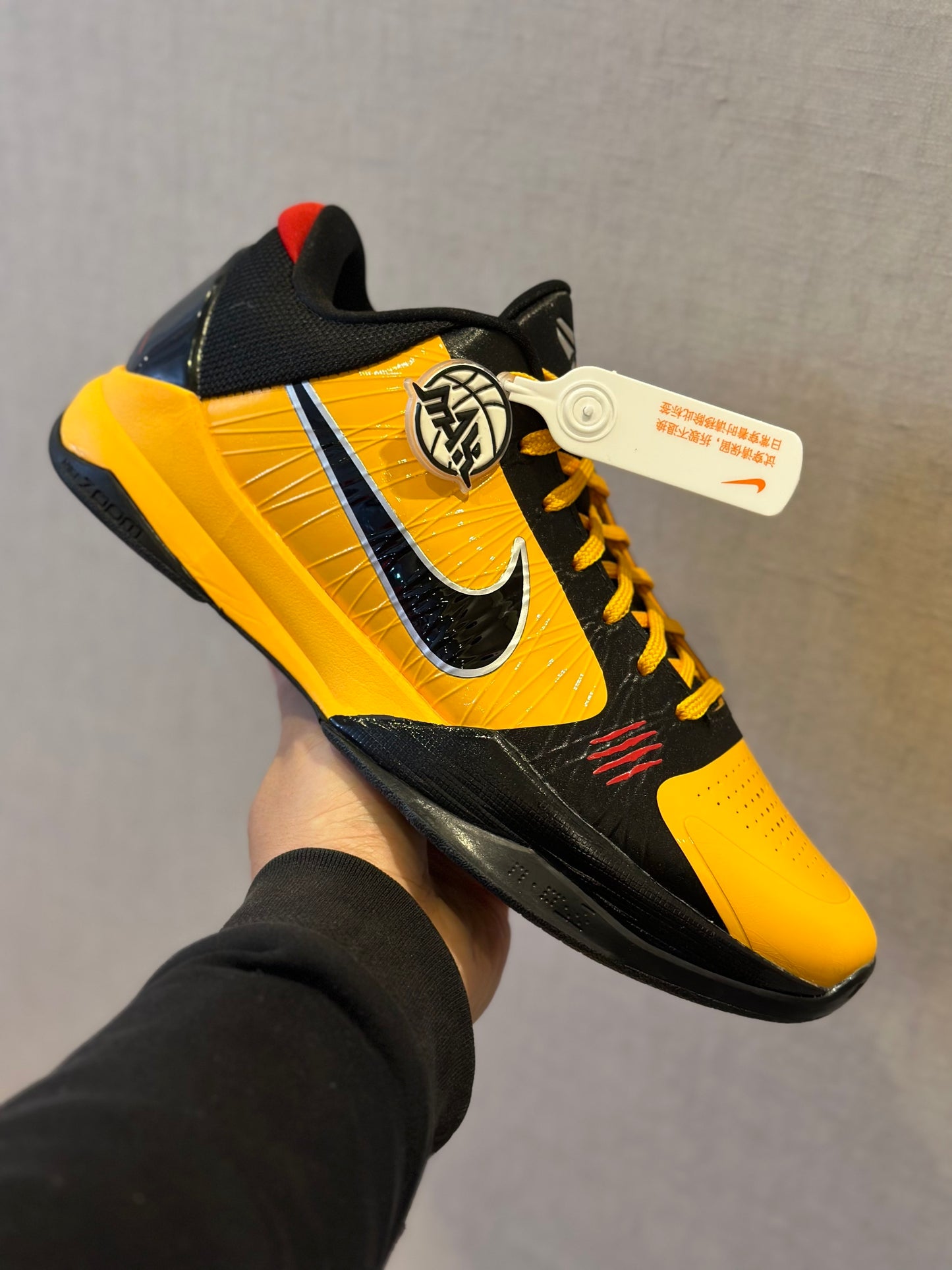 Nike Kobe 5 Protro Bruce Lee basketball shoes in yellow and black colorway
