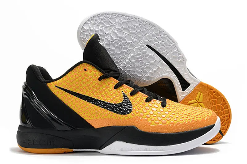 Nike Kobe 6 Protro Lightbulb edition sneakers in bright yellow with sleek low-top design.
