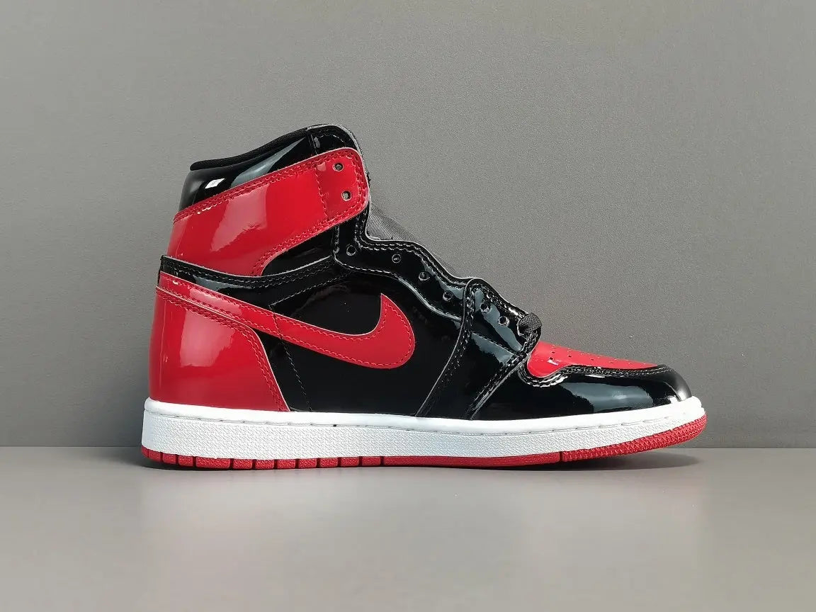 Jordan 1 Retro High Patent Bred black red patent leather sneaker
