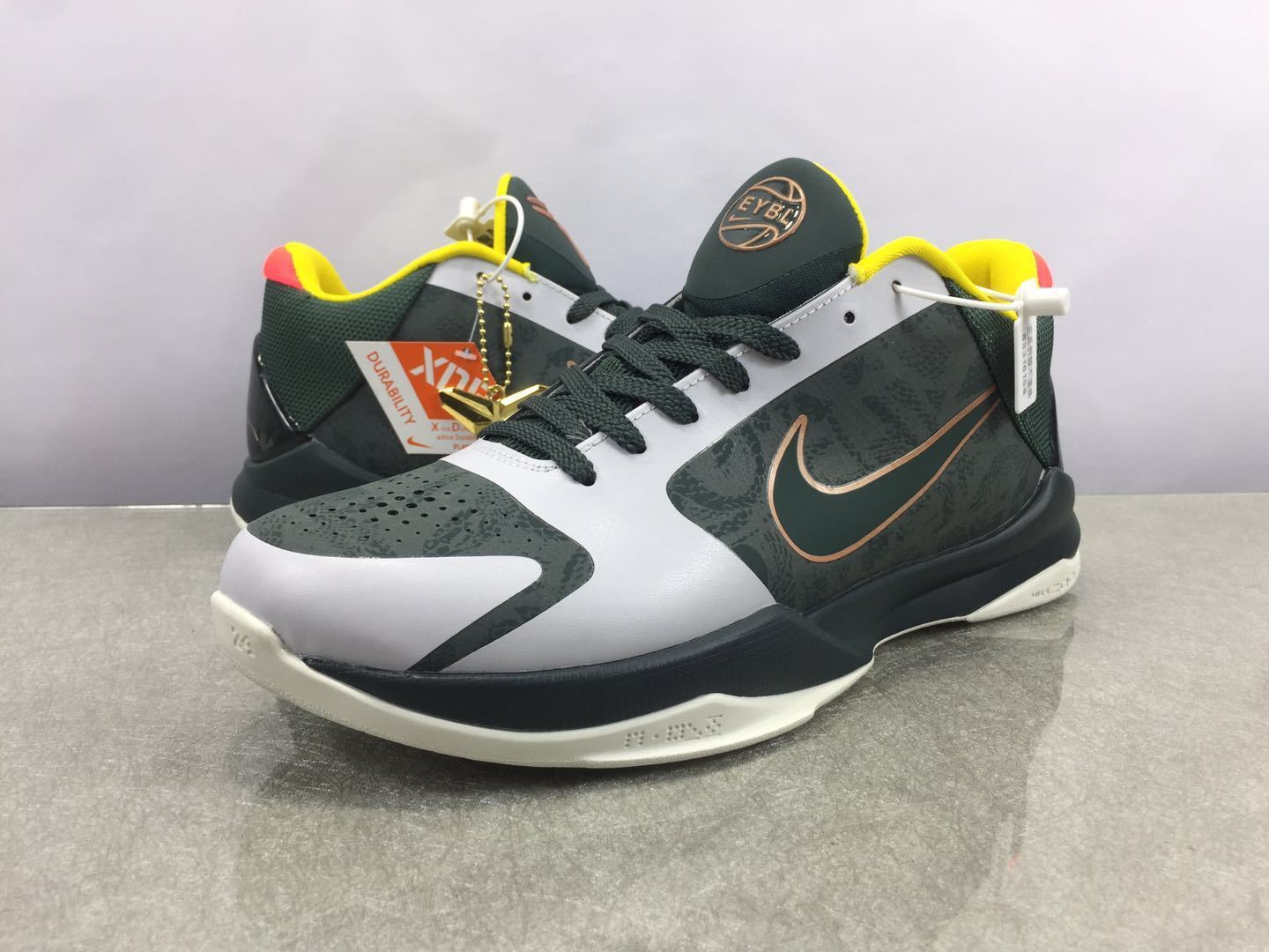 Nike Kobe 5 Protro EYBL basketball shoes in vibrant multicolor tournament-inspired design
