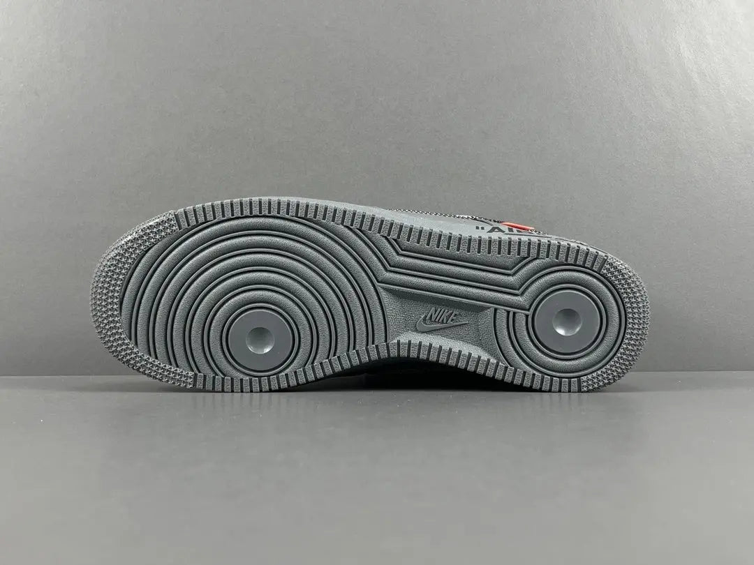 Nike Air Force 1 x Off-White custom grey sneaker with deconstructed design and zip tie
