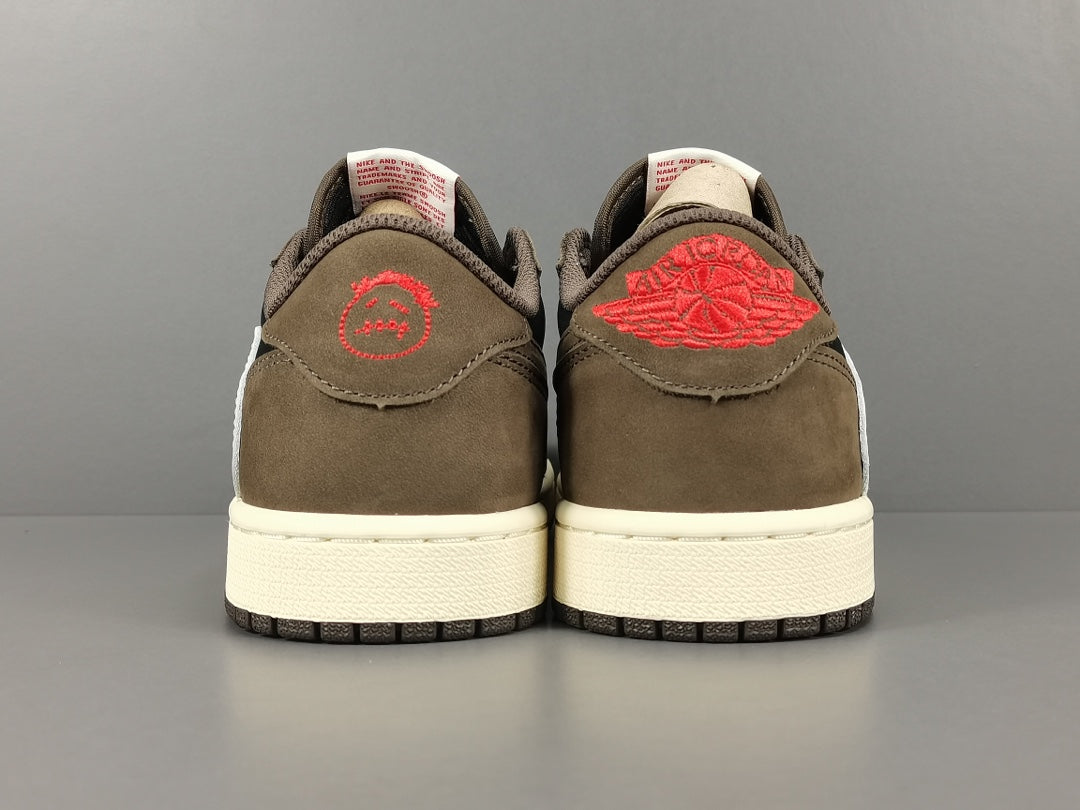 "Air Jordan 1 Low OG SP x Travis Scott sneakers featuring signature reverse Swoosh, premium materials, and Cactus Jack branding." 