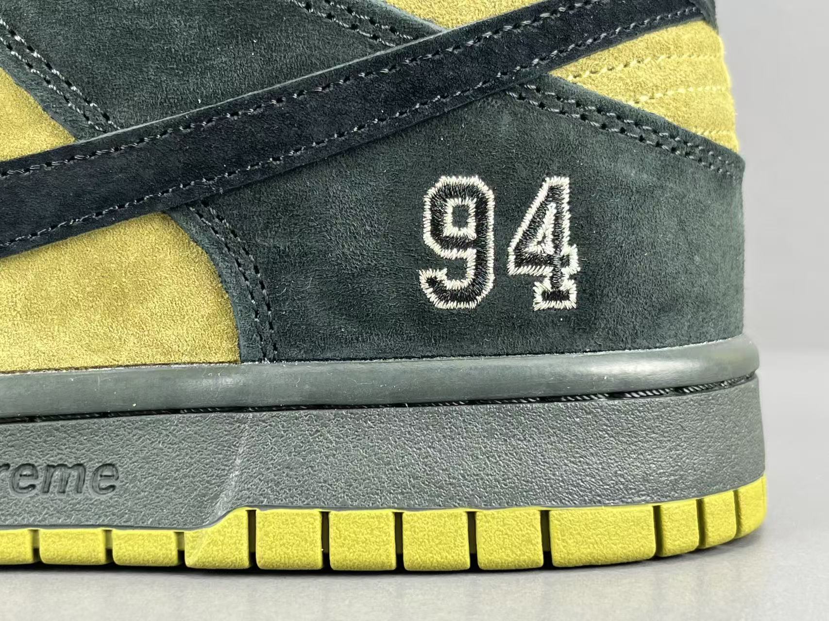 Nike SB Dunk Low x Supreme 94 Camper Green sneaker premium leather
