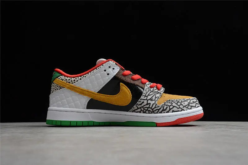 Nike SB Dunk Low What The Paul colorful patchwork upper with Nike Swoosh lateral view on white background