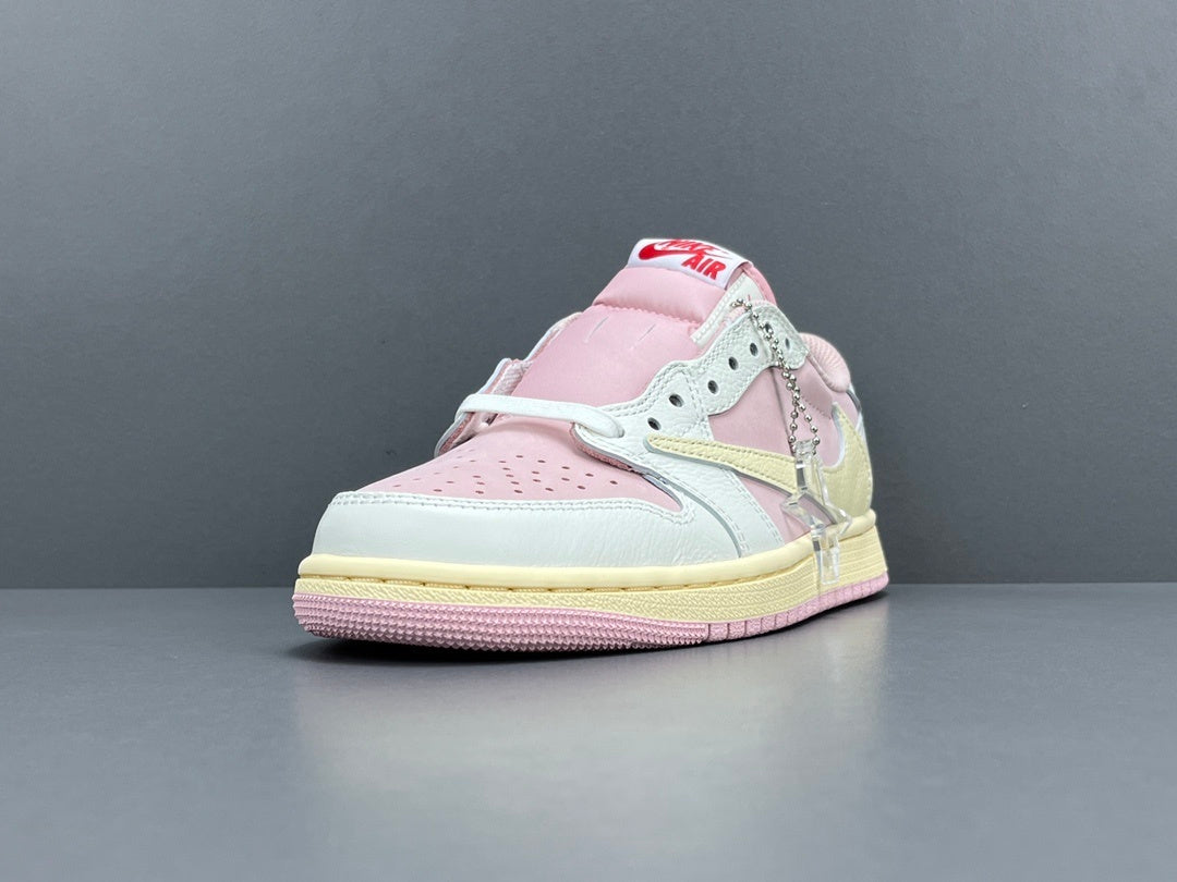 Jordan 1 Low x Travis Scott Shy Pink sneakers with reversed Swoosh design