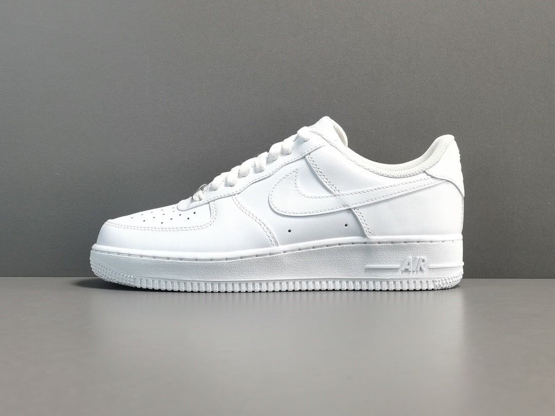 White Nike Air Force sneaker on a gray background