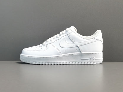 White Nike Air Force sneaker on a gray background