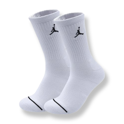 White Jordan cotton crew socks with a soft knit texture, ribbed cuffs for a secure fit, and the iconic Jumpman logo displayed near the top in a contrasting color.